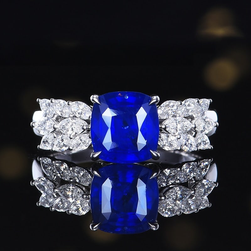14k Gold 3.21 Ctw Vivid Blue Natural Sapphire & Diamond Ring: Ref:231104279 // gold content:14k gold // ring size:7. 25us // // main gemstone:sapphire // shape:cushion // carat weight:2. 57ct // color:vivid blue // treatment:natural // // adjacent gemstone 2