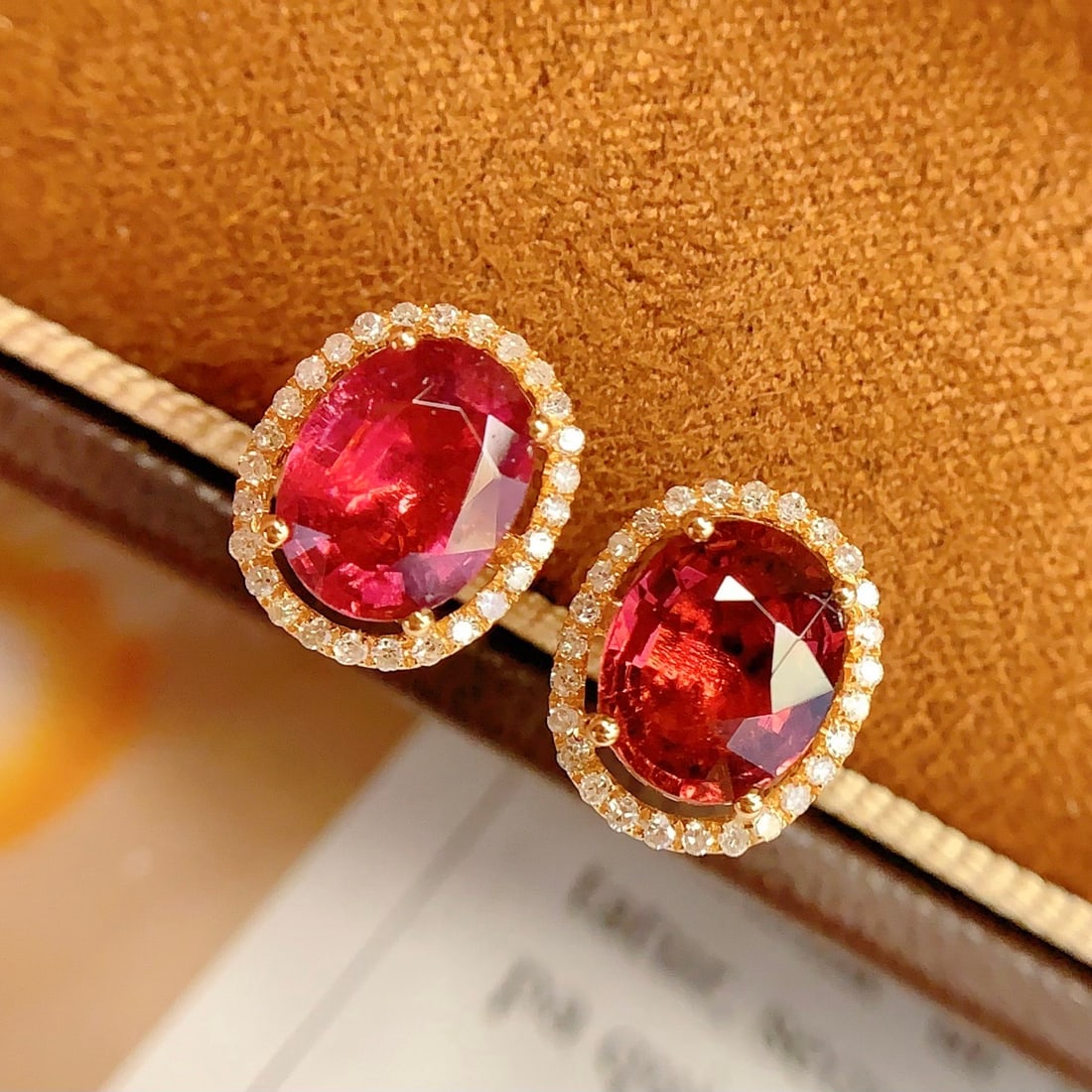 14k Gold 3.5 Ct Natural Tourmaline & Diamond Earrings: Ref:231104285 // gold content:14k gold // main gemstone:tourmaline // shape:oval // carat weight:3. 5ct // color:red // treatment:natural // // adjacent gemstone 2 : diamond // number of stones:53 //