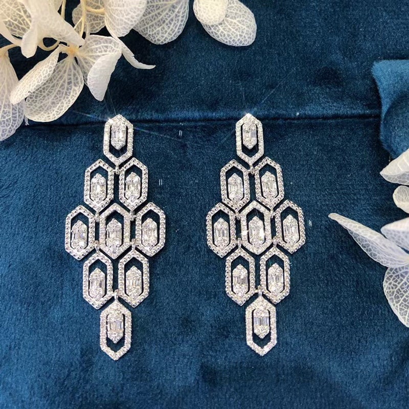 14k Gold 1.24 Ct Natural H Diamond Earrings: Ref:231104316 // gold content:14k gold // main gemstone:diamond // shape:multiple // carat weight:1. 24ct // clarity grade:vs-si // color:h // treatment:natural // Condition: NewLow Estimate: