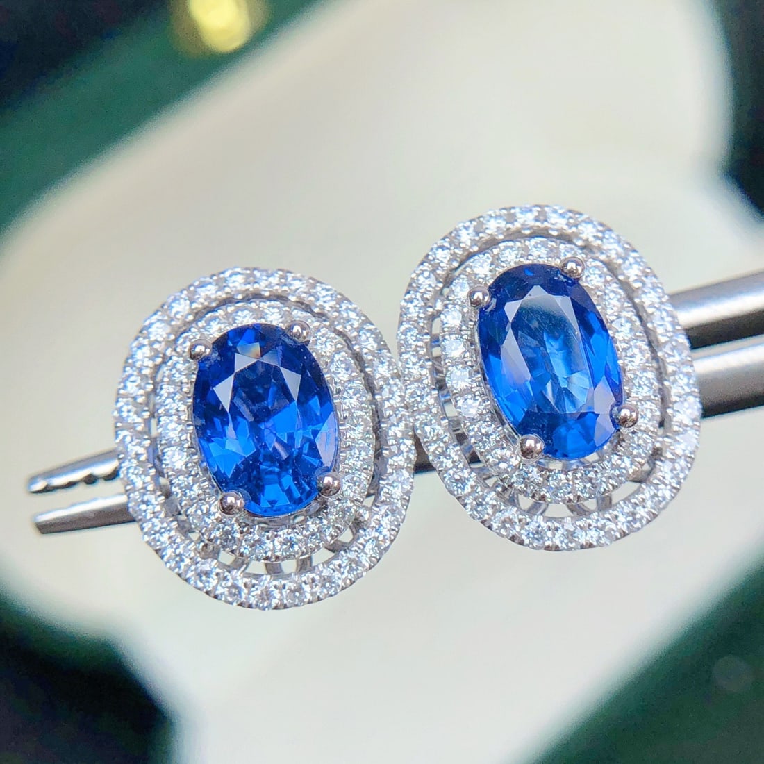 14k Gold 2.22 Ctw Natural Sapphire & Diamond Earrings: Ref:231104323 // gold content:14k gold // main gemstone:sapphire // shape:oval // carat weight:1. 70ct // color:cornflower blue // treatment:natural // // adjacent gemstone 2 : diamond //