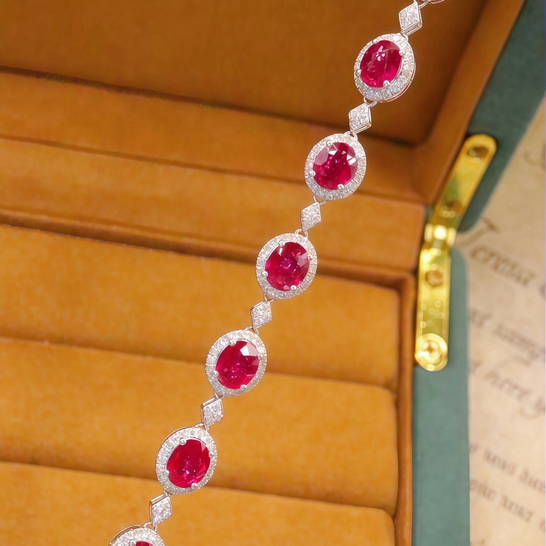 14k Gold 4.24 Ctw Natural Ruby & Diamond Bracelet: Ref:231104349 // gold content:14k gold // main gemstone:ruby // shape:oval // carat weight:3. 45ct // color:pigeonblood red // treatment:natural // // adjacent gemstone 2 : diamond // number of stones