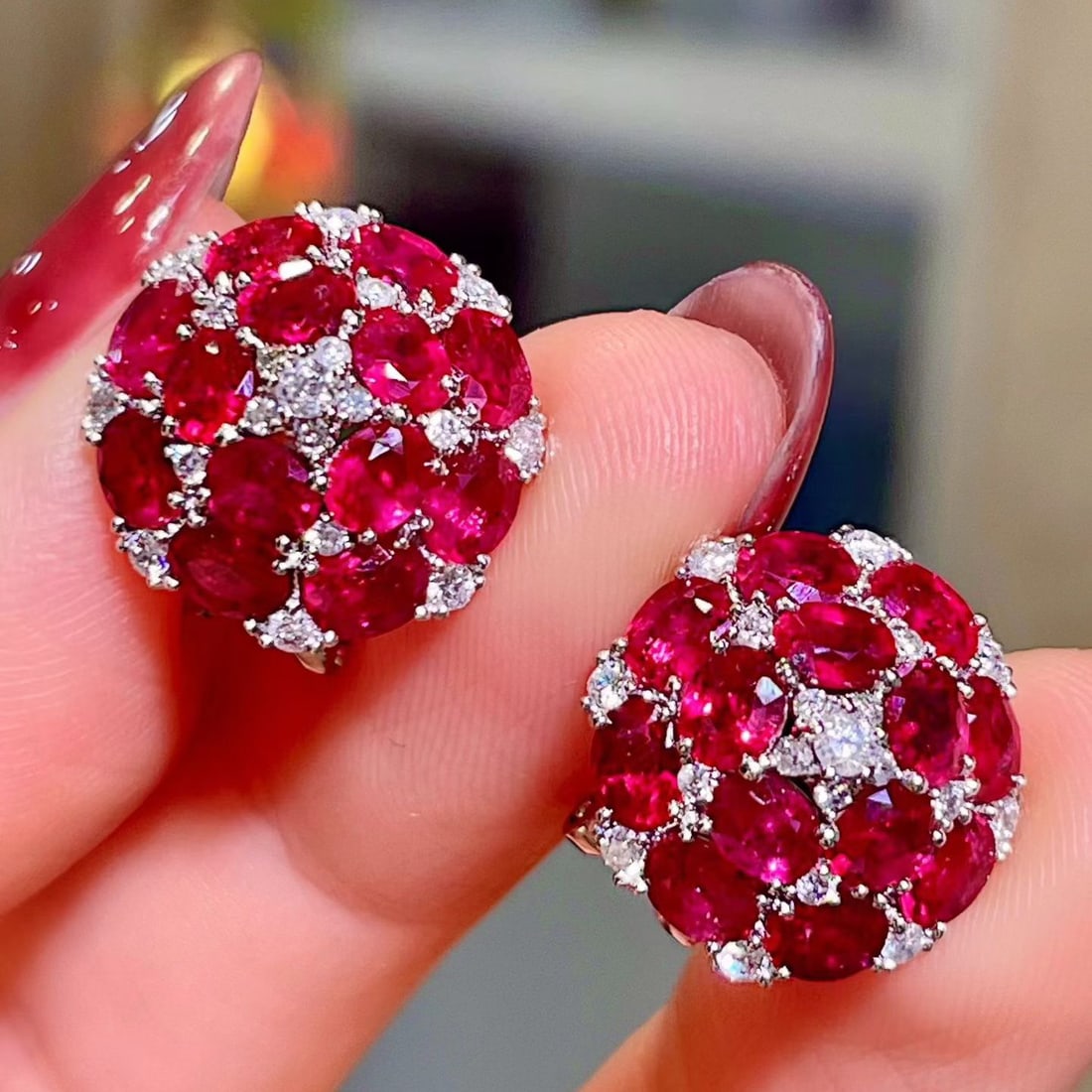 14k Gold 6.61 Ctw Natural Ruby & Diamond Earrings: Ref:231104414 // gold content:14k gold // main gemstone:ruby // shape:oval // carat weight:6. 15ct // color:red // treatment:natural // // adjacent gemstone 2 : diamond // shape:round // carat weight: