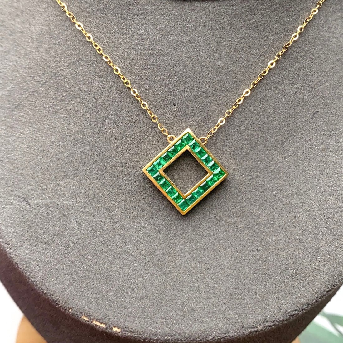 14k Gold 1.40 Ct Natural Emerald Necklace: Ref:231104421 // gold content:14k gold // main gemstone:emerald // shape:square // carat weight:1. 40ct // color:green // treatment:natural // Condition: New Low Estimate: 3700.00 High Estimate: 5600