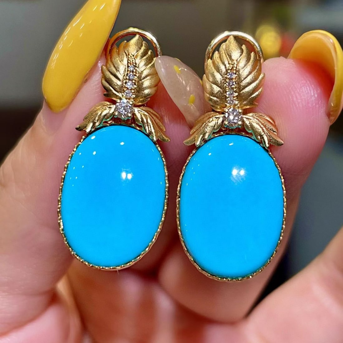 14k Gold 14.96 Ctw Natural Blue Turquoise & Diamond Earrings: Ref:231105053 // gold content:14k gold // main gemstone:blue turquoise // shape:oval // carat weight:14. 81ct // color:blue // treatment:natural // // adjacent gemstone 2 : diamond // shape:round