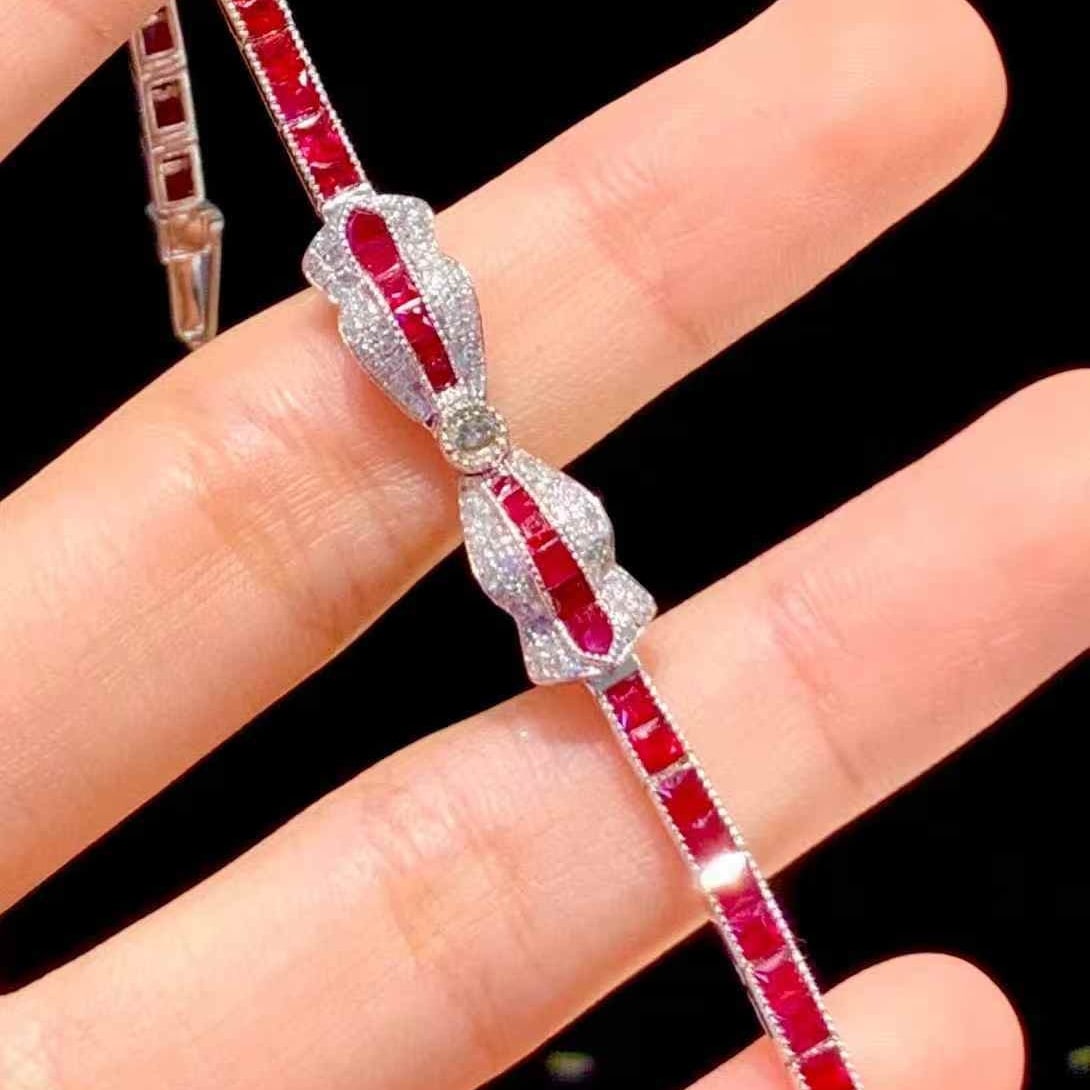 14k Gold 6 Ct Natural Ruby & Diamond Bracelet: Ref:231105068 // gold content:14k gold // main gemstone:ruby // shape:princess // carat weight:6ct // color:pigeonblood red // treatment:natural // // adjacent gemstone 2 : diamond // shape:round // c