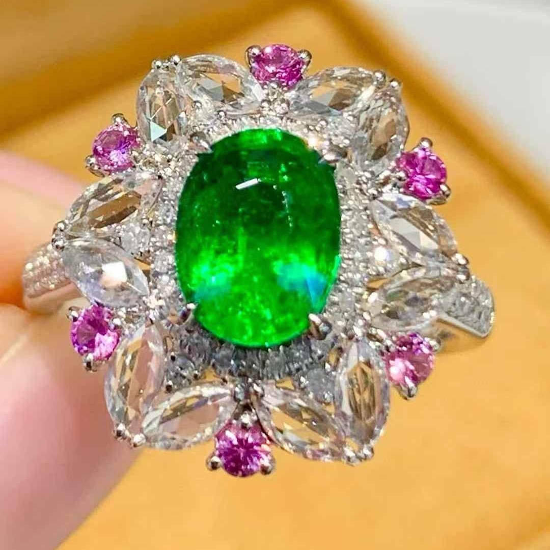 14k Gold 1.65 Ct Natural Tsavorite & Diamond & Coloured Gemstone Ring: Ref:231105138 // gold content:14k gold // ring size:7. 25us // // main gemstone:tsavorite // shape:oval // carat weight:1. 65ct // color:green // treatment:natural // // adjacent gemstone 2 :