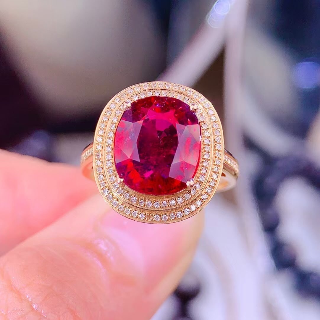 14k Gold 5.00 Ct Natural Tourmaline & Diamond Ring: Ref:231105181 // gold content:14k gold // ring size:7. 25us // // main gemstone:tourmaline // shape:oval // carat weight:5. 00ct // color:red // treatment:natural // // adjacent gemstone 2 :