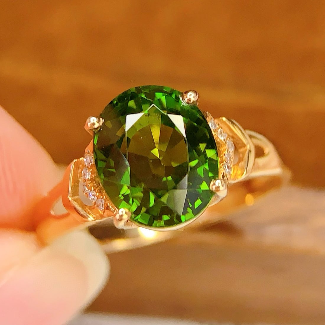14k Gold 2.8 Ct Natural Tourmaline & Diamond Ring: Ref:231105183 // gold content:14k gold // ring size:7. 25us // // main gemstone:tourmaline // shape:oval // carat weight:2. 8ct // color:green // treatment:natural // // adjacent gemstone 2 :