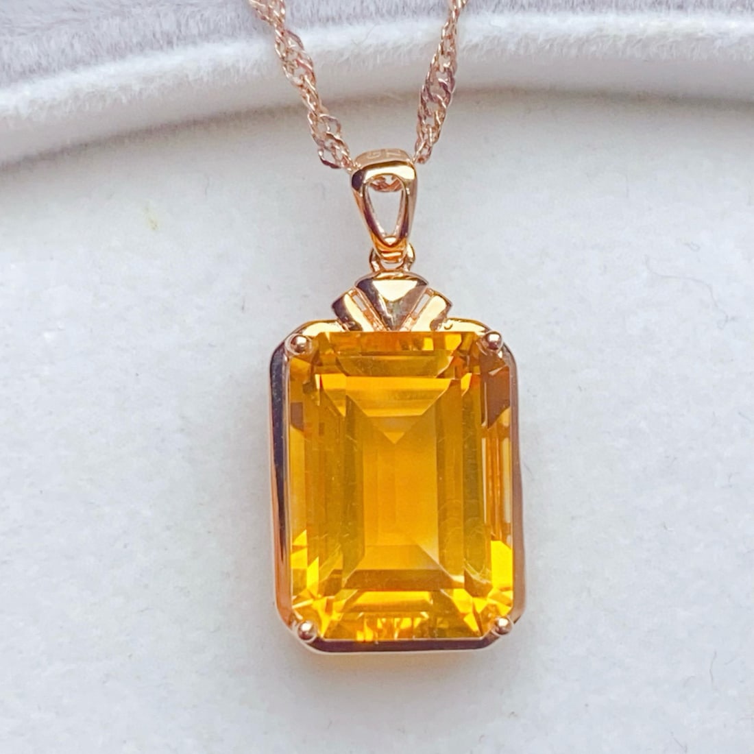 14k Gold 7.7 Ct Natural Citrine Pendant( Without Chain ): Ref:231105189 // gold content:14k gold // main gemstone:citrine // shape:octagonal // carat weight:7. 7ct // color:yellow // treatment:natural // High Estimate: 2100Low Estimate: 1400Condition: New