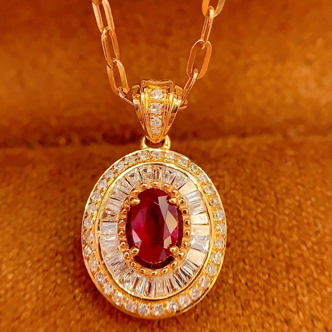 14k Gold 0.4 Ct Natural Ruby & Diamond Pendant( Without Chain ): Ref:231105238 // gold content:14k gold // main gemstone:ruby // shape:oval // carat weight:0. 4ct // color:red // treatment:natural // // adjacent gemstone 2 : diamond // number of stones:65 //