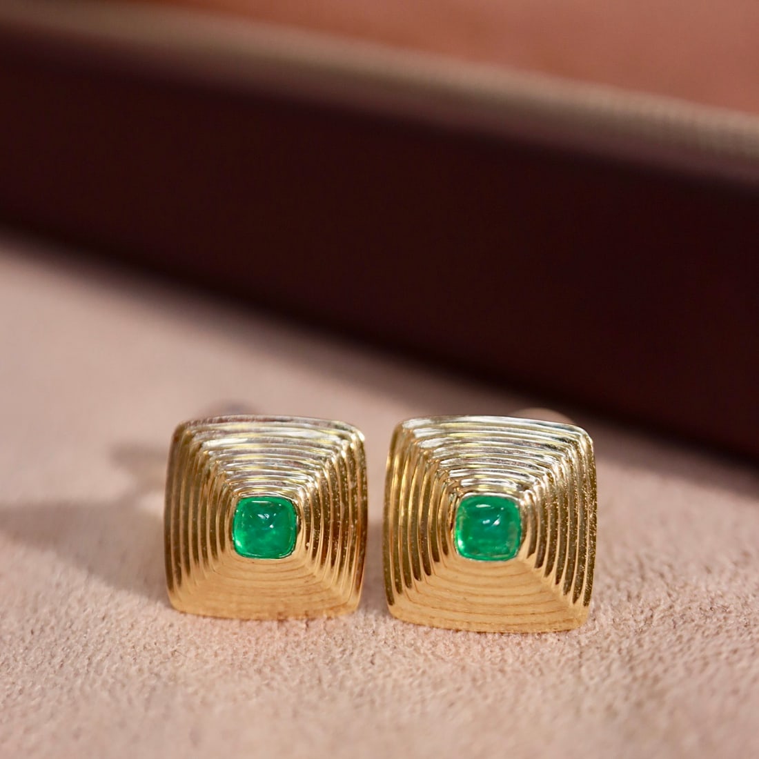 14k Gold 0.26 Ct Vivid Green Natural Emerald Earrings: Ref:231106031 // gold content:14k gold // main gemstone:emerald // shape:sugar-loaf // carat weight:0. 26ct // color:vivid green // treatment:natural // Condition: NewHigh Estimate: 2600Low