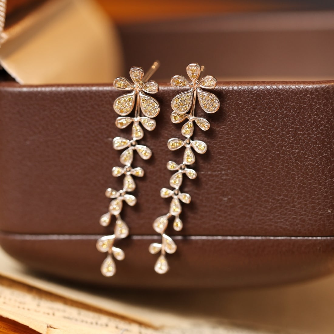 14k Gold 0.4 Ct Natural Yellow Diamond Earrings: Ref:231106090 // gold content:14k gold // main gemstone:yellow diamond // shape:round // carat weight:0. 4ct // color:yellow // treatment:natural // cut grade:g // Condition: NewHigh Estimate: