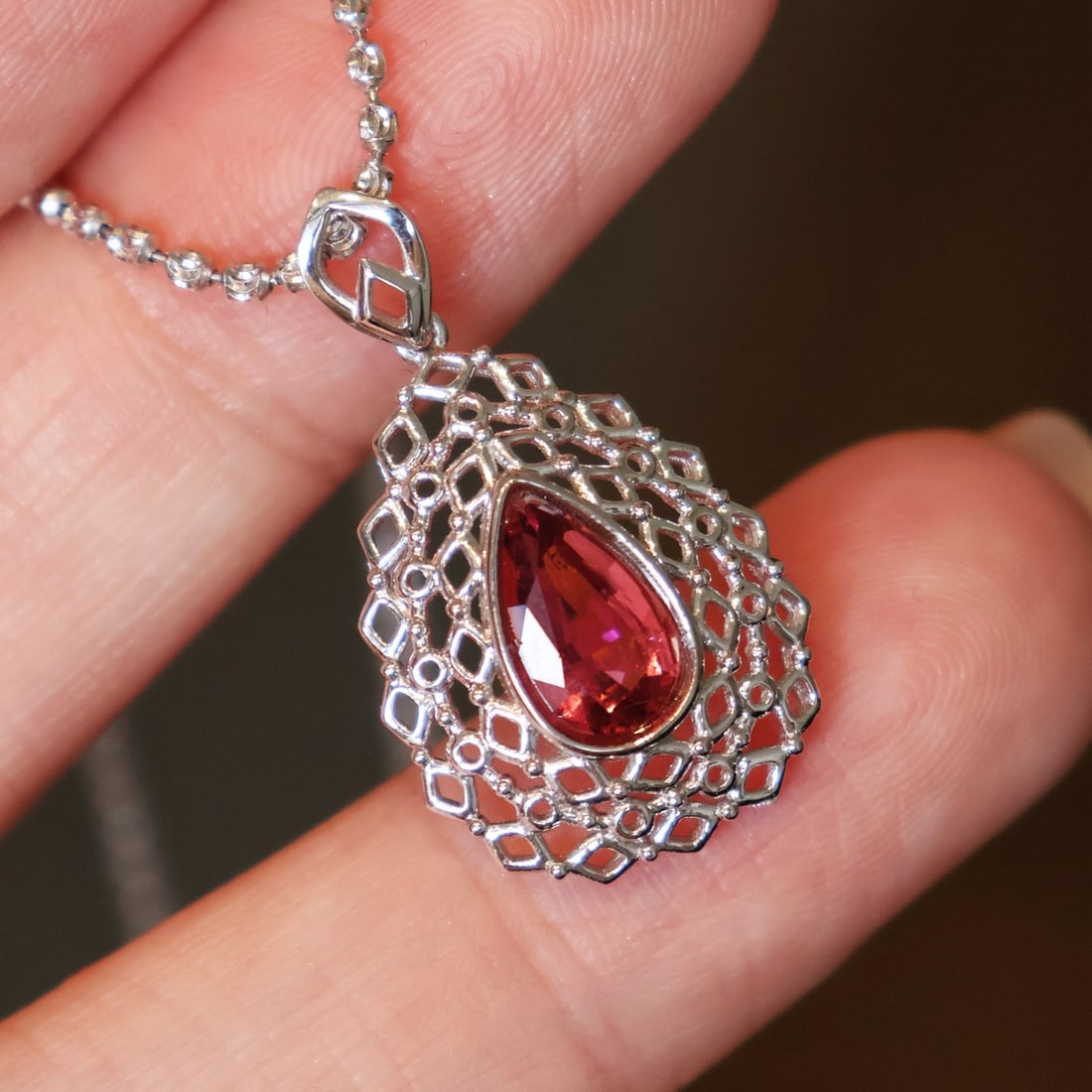 14k Gold 1.5 Ct Natural Tourmaline Pendant( Without Chain ): Ref:231106188 // gold content:14k gold // main gemstone:tourmaline // shape:pear // carat weight:1. 5ct // color:red // treatment:natural // Low Estimate: 1500Condition: NewHigh Estimate: 2300