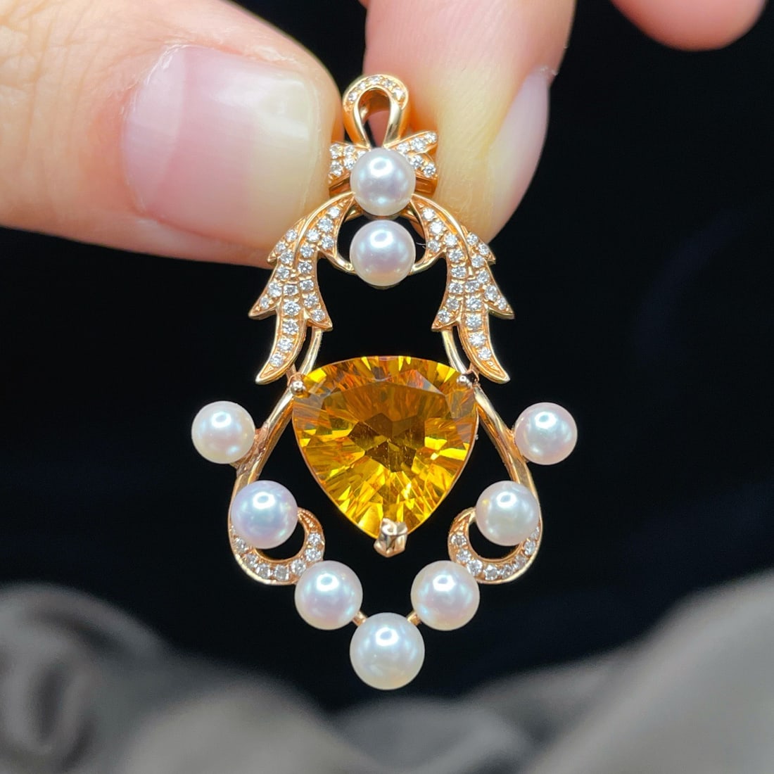 14k Gold 5.73 Ctw Natural Citrine & Diamond Pendant( Without Chain ): Ref:231106202 // gold content:14k gold // main gemstone:citrine // shape:pear // carat weight:5. 5ct // color:yellow // treatment:natural // // adjacent gemstone 2 : diamond // shape:round // carat