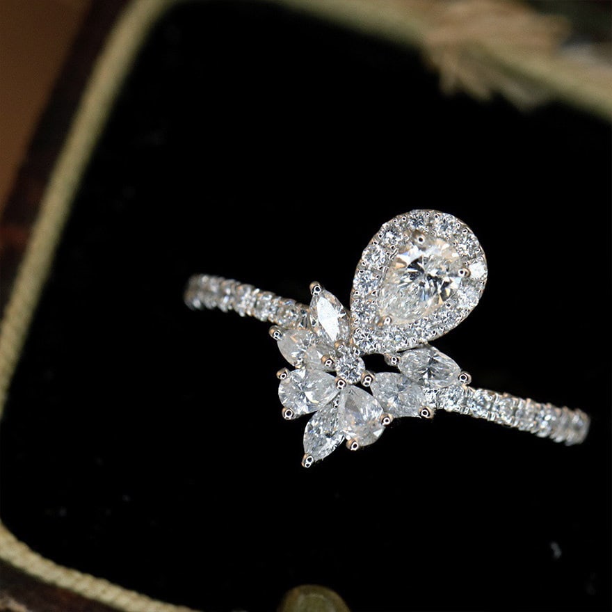 14k Gold 0.70 Ctw Natural H Diamond Ring: Ref:231106251 // gold content:14k gold // ring size:7. 25us // // main gemstone:diamond // shape:pear // carat weight:0. 20ct // clarity grade:vs-si // color:h // treatment:natural // // adjacent gems