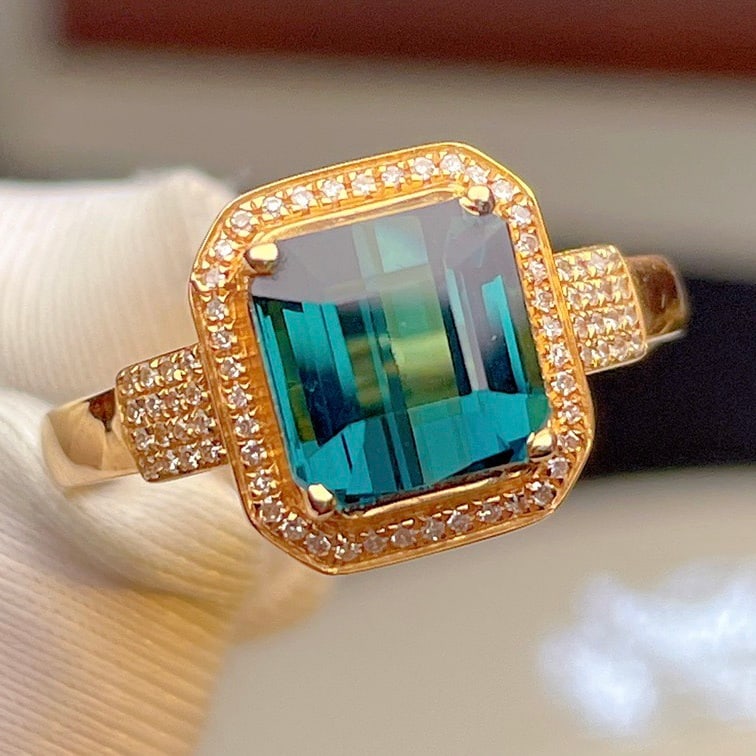 14k Gold 3.23 Ct Natural Tourmaline & Diamond Ring: Ref:231106288 // gold content:14k gold // ring size:7. 25us // // main gemstone:tourmaline // shape:octagonal // carat weight:3. 23ct // color:blue // treatment:natural // // adjacent gemstone 2 :