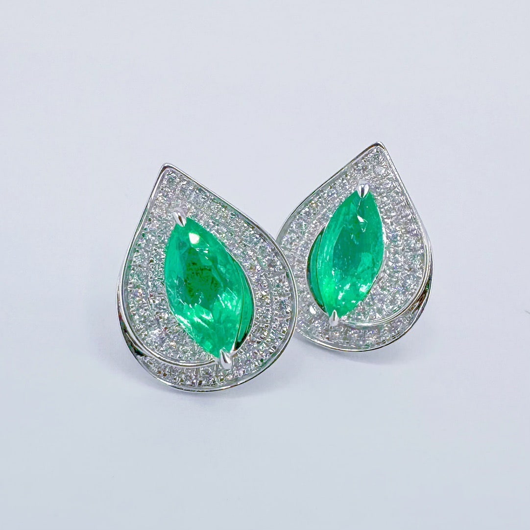 14k Gold 1.78 Ctw Natural Emerald & Diamond Earrings: Ref:231106291 // gold content:14k gold // main gemstone:emerald // shape:marquise // carat weight:1. 30ct // color:green // treatment:natural // // adjacent gemstone 2 : diamond // shape:round //