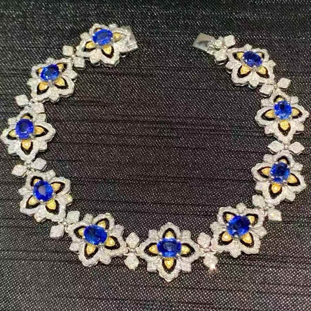 14k Gold 7.2 Ct Natural Sapphire & Diamond Bracelet: Ref:231107063 // gold content:14k gold // main gemstone:sapphire // shape:oval // carat weight:7. 2ct // color:royal blue // treatment:natural // // adjacent gemstone 2 : diamond // shape:round //