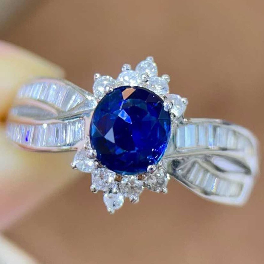 14k Gold 3.09 Ctw Natural Sapphire & Diamond Ring: Ref:231108067 // gold content:14k gold // ring size:7. 25us // // main gemstone:sapphire // shape:oval // carat weight:1. 35ct // color:blue // treatment:natural // // adjacent gemstone 2 :