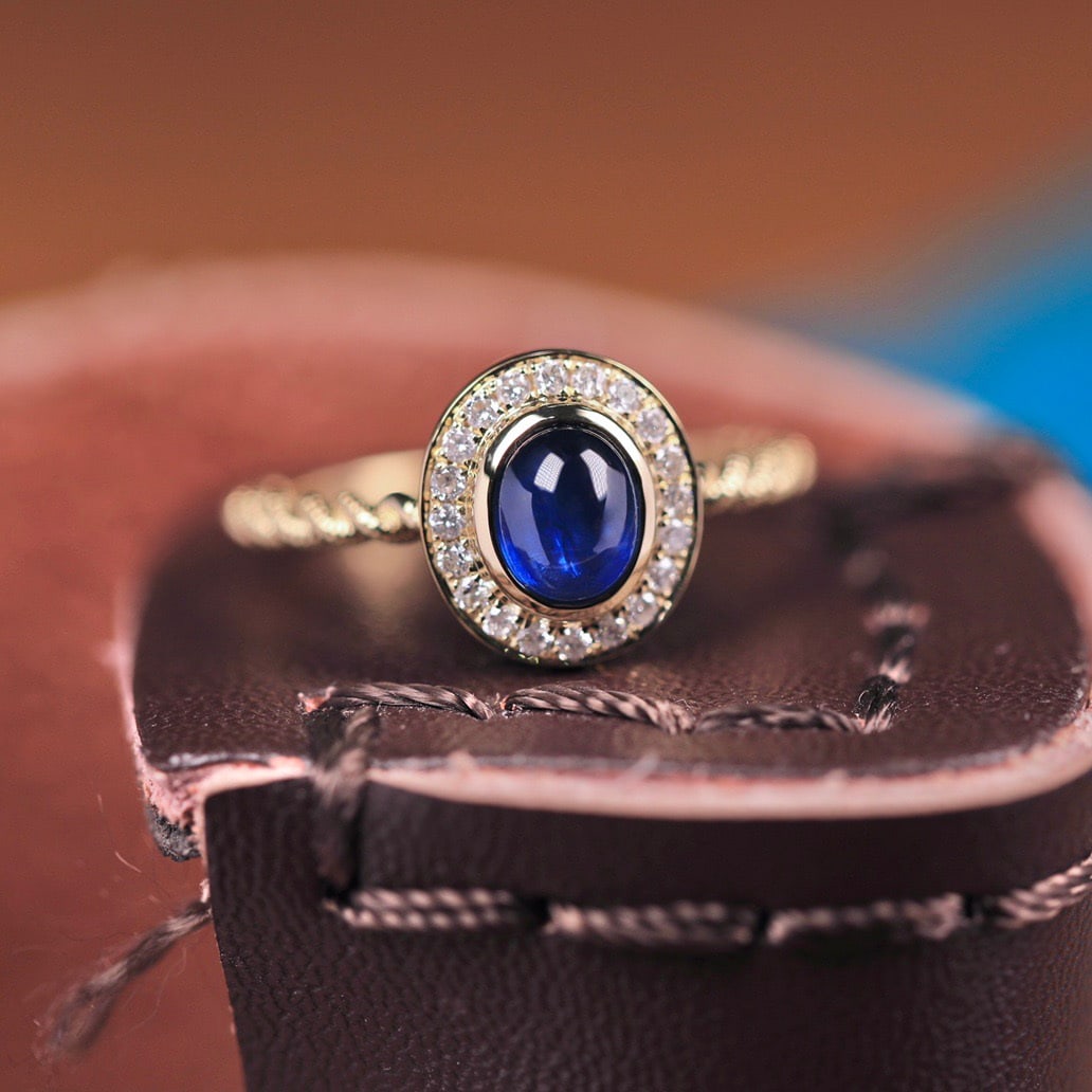 14k Gold 0.75 Ct Vivid Blue Natural Sapphire & Diamond Ring: Ref:231108096 // gold content:14k gold // ring size:7. 25us // // main gemstone:sapphire // shape:oval // carat weight:0. 75ct // color:vivid blue // treatment:natural // // adjacent gemstone 2 :