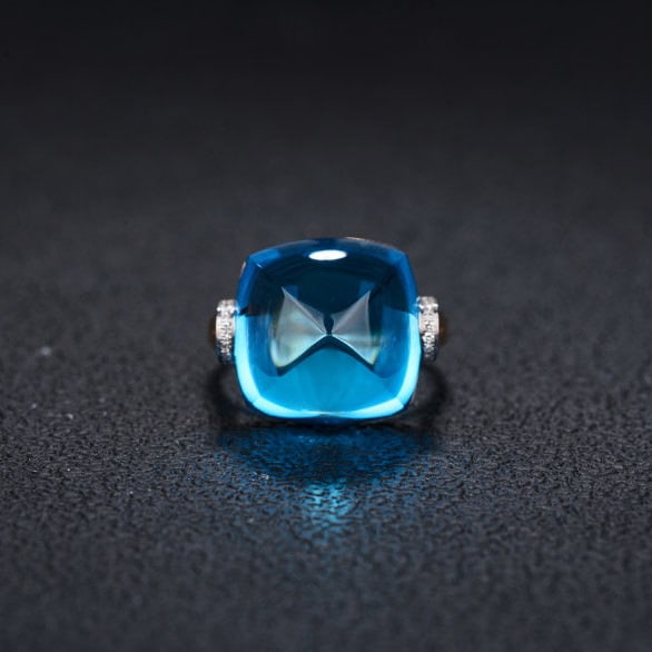 14k Gold 22.56 Ct Natural Topaz & Diamond Ring: Ref:231108236 // gold content:14k gold // ring size:7. 25us // // main gemstone:topaz // shape:sugar-loaf // carat weight:22. 56ct // color:blue // treatment:natural // // adjacent gemstone 2 :