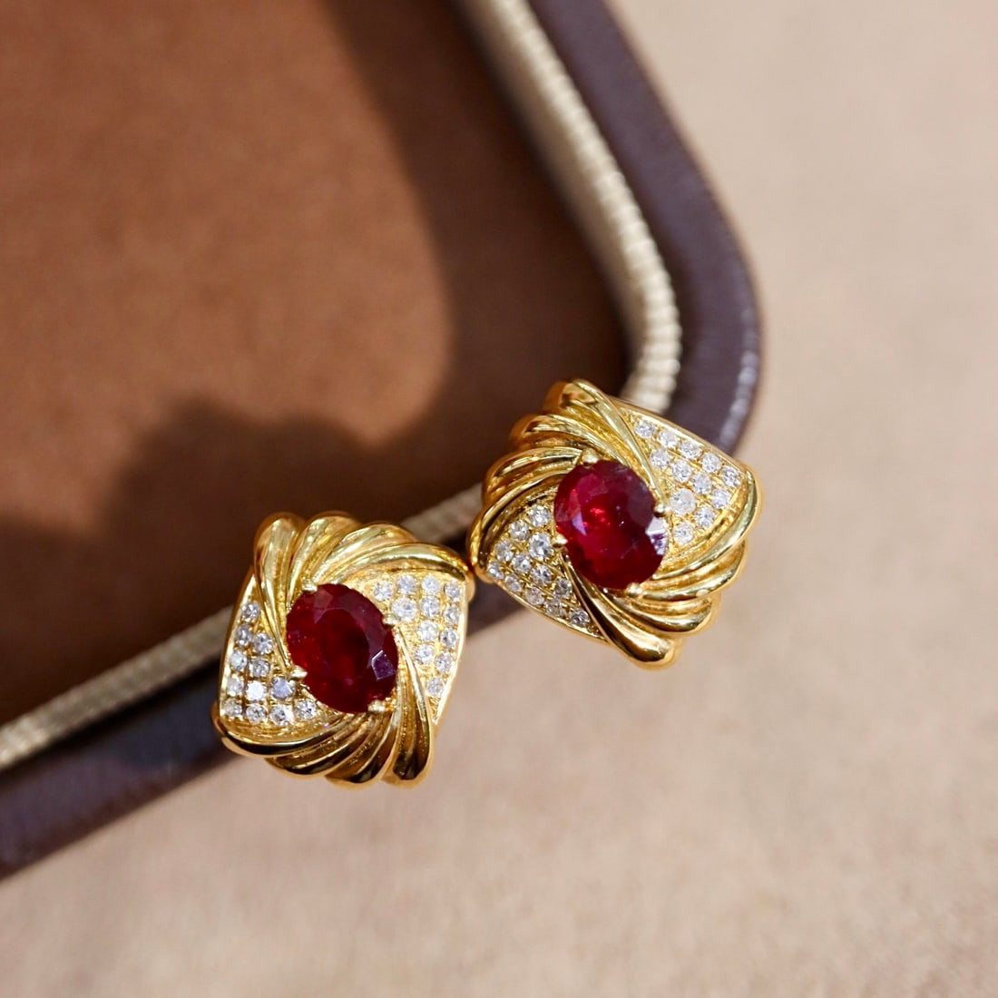 14k Gold 1.12 Ctw Natural Ruby & Diamond Earrings: Ref:231108262 // gold content:14k gold // main gemstone:ruby // shape:oval // carat weight:1. 0ct // color:red // treatment:natural // // adjacent gemstone 2 : diamond // shape:round // carat