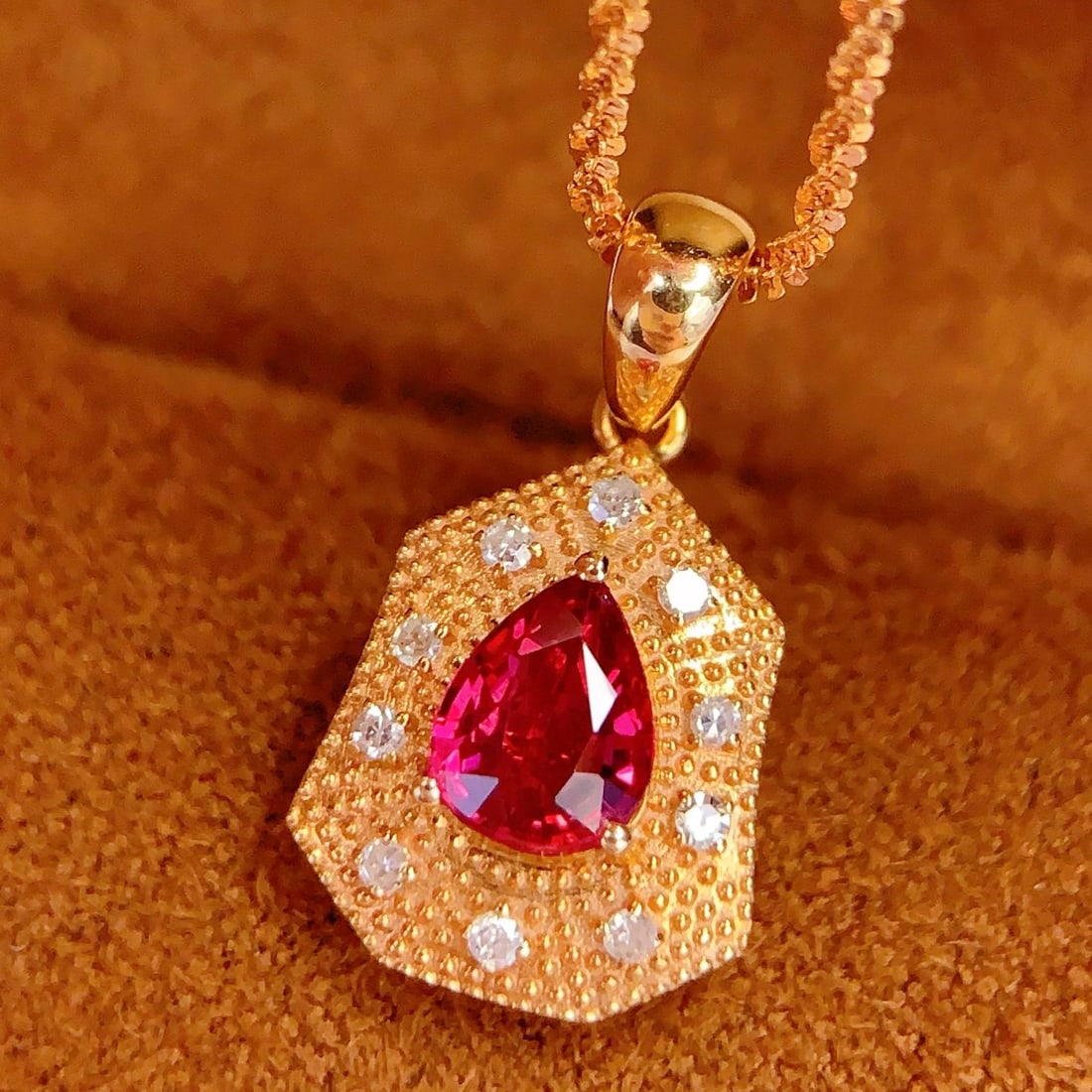 14k Gold 0.4 Ct Natural Ruby & Diamond Pendant( Without Chain ): Ref:231108361 // gold content:14k gold // main gemstone:ruby // shape:pear // carat weight:0. 4ct // color:red // treatment:natural // // adjacent gemstone 2 : diamond // number of stones:10 //
