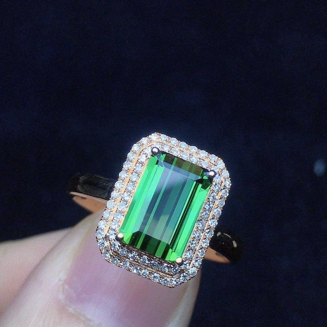 14k Gold 1.85 Ct Natural Tourmaline & Diamond Ring: Ref:231108404 // gold content:14k gold // ring size:7. 25us // // main gemstone:tourmaline // shape:octagonal // carat weight:1. 85ct // color:green // treatment:natural // // adjacent gemstone 2