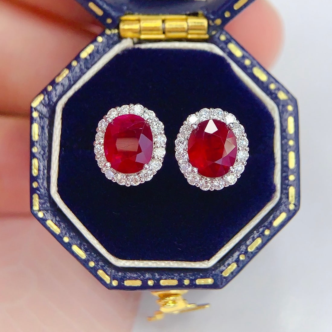14k Gold 2 Ct Vivid Red Natural Ruby & Diamond Earrings: Ref:231108443 // gold content:14k gold // main gemstone:ruby // shape:oval // carat weight:2ct // color:vivid red // treatment:natural // // adjacent gemstone 2 : diamond // number of stones:32 //
