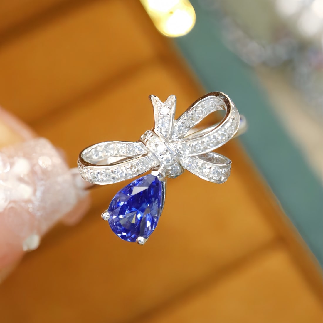 14k Gold 1.26 Ctw Natural Sapphire & Diamond Ring: Ref:231110090 // gold content:14k gold // ring size:7. 25us // // main gemstone:sapphire // shape:pear // carat weight:1. 08ct // color:royal blue // treatment:natural // // adjacent gemstone 2 :