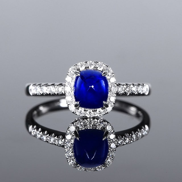 14k Gold 2.02 Ctw Natural Sapphire & Diamond Ring: Ref:231110262 // gold content:14k gold // ring size:7. 25us // // main gemstone:sapphire // shape:sugar-loaf // carat weight:1. 76ct // color:royal blue // treatment:natural // // adjacent