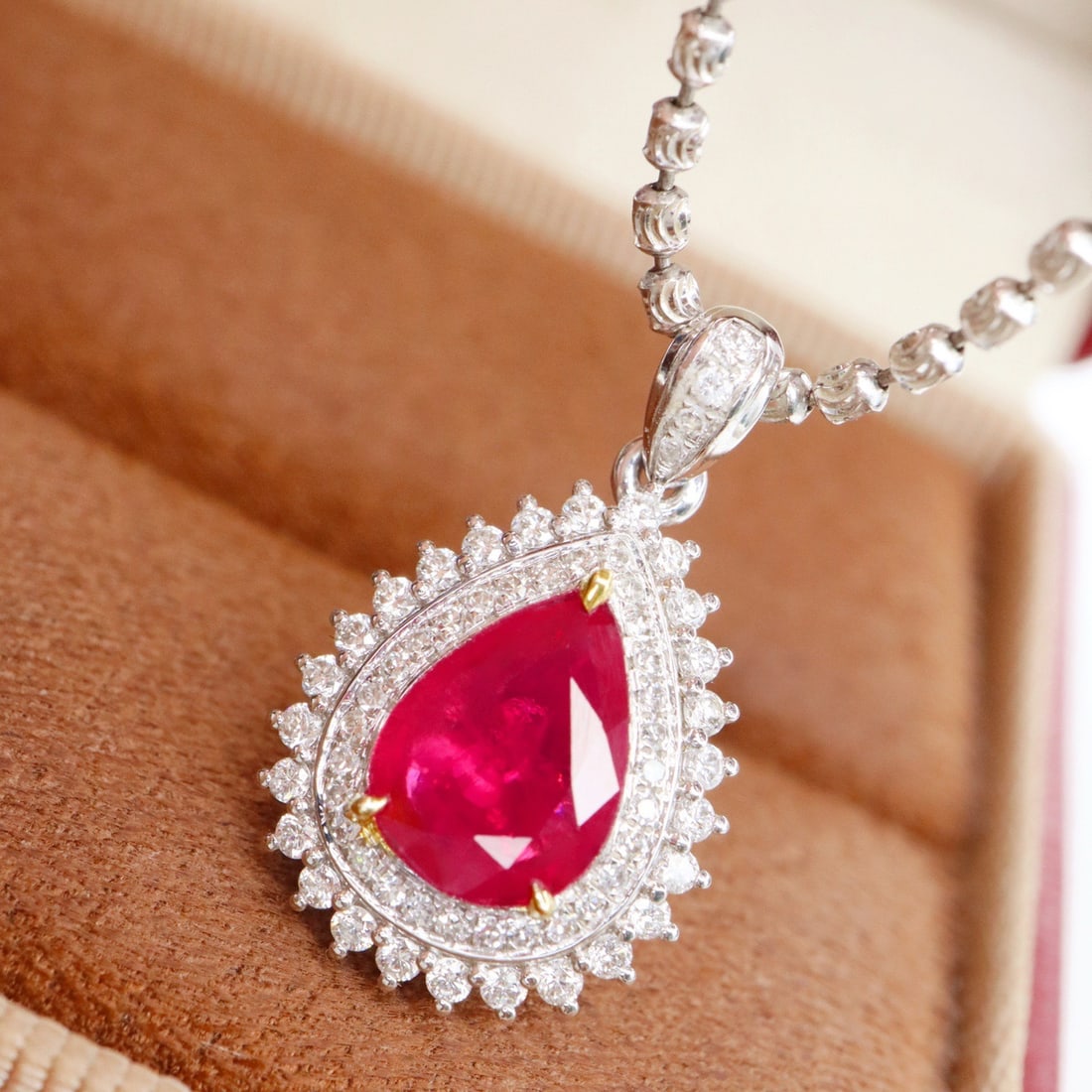 14k Gold 1.41 Ctw Natural Ruby & Diamond Pendant( Without Chain ): Ref:231110372 // gold content:14k gold // main gemstone:ruby // shape:pear // carat weight:1. 10ct // color:red // treatment:natural // // adjacent gemstone 2 : diamond // shape:round // carat