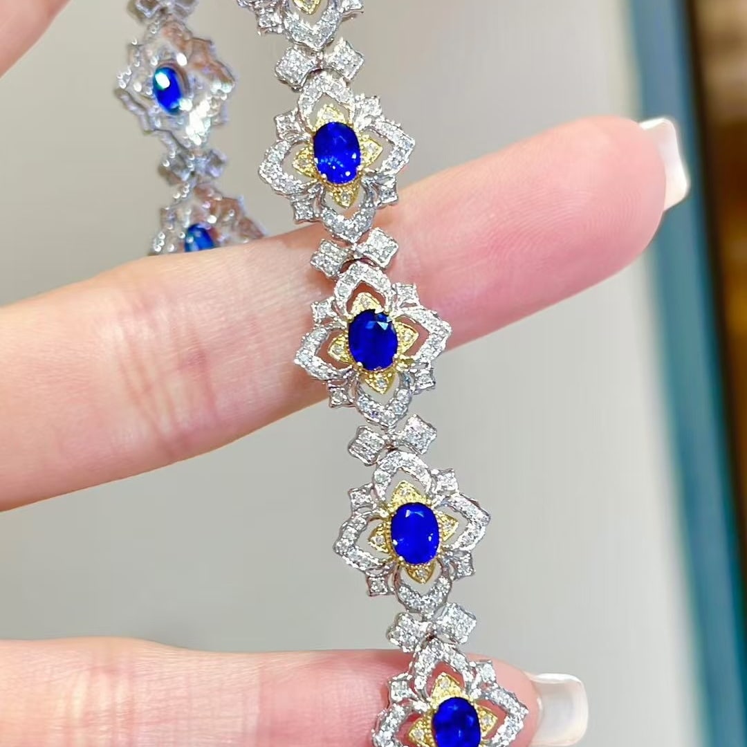 14k Gold 4.35 Ct Natural Sapphire & Diamond Bracelet: Ref:231111028 // gold content:14k gold // main gemstone:sapphire // shape:oval // carat weight:4. 35ct // color:royal blue // treatment:natural // // adjacent gemstone 2 : diamond // shape:round //
