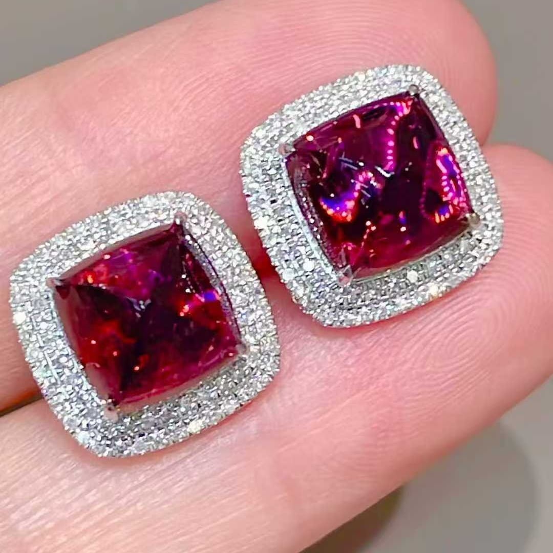 14k Gold 7 Ct Natural Tourmaline & Diamond Earrings: Ref:231111095 // gold content:14k gold // main gemstone:tourmaline // shape:sugar-loaf // carat weight:7ct // color:red // treatment:natural // // adjacent gemstone 2 : diamond // shape:round //