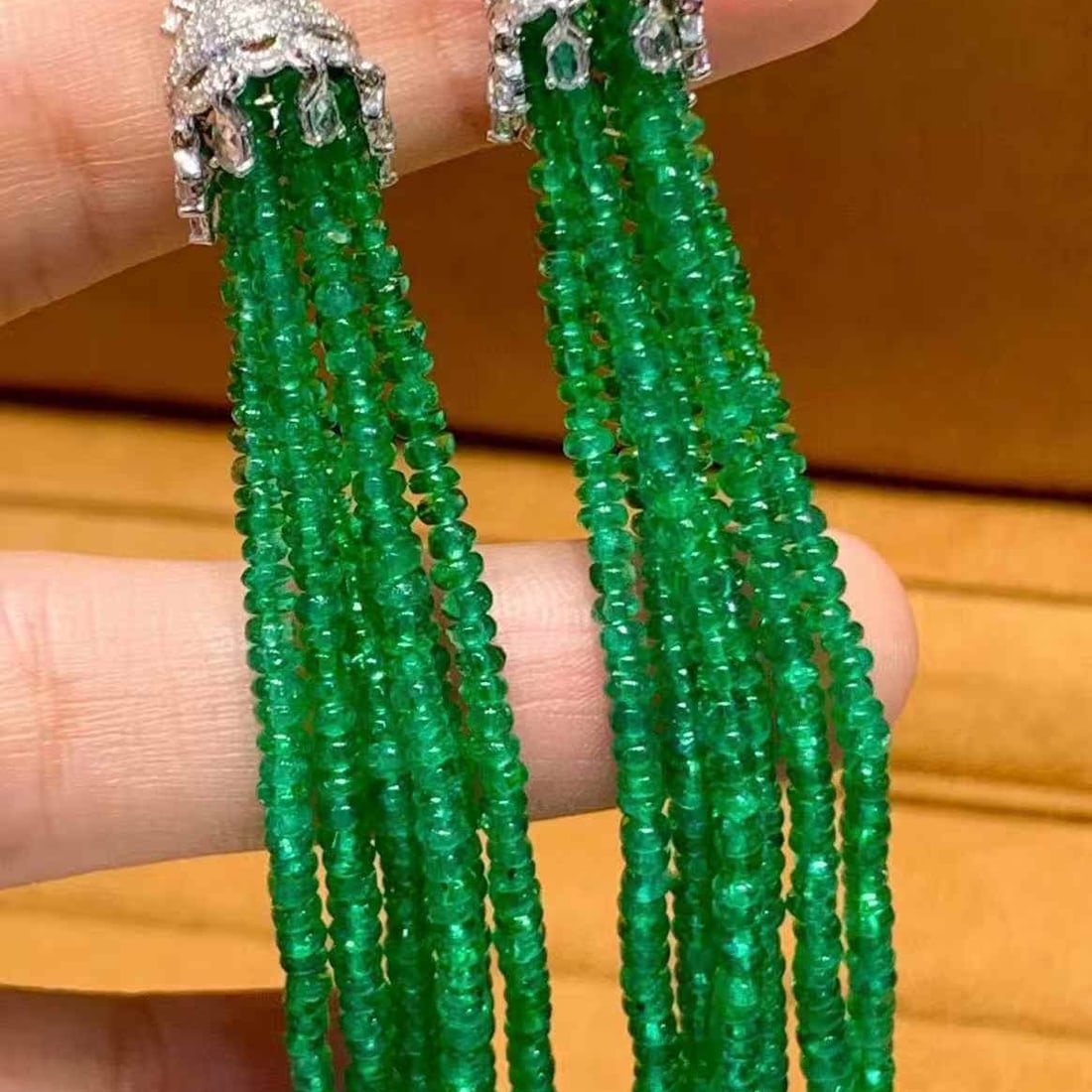 14k Gold 41 Ct Natural Emerald & Diamond Earrings: Ref:231111105 // gold content:14k gold // main gemstone:emerald // shape:bead // carat weight:41ct // color:green // treatment:natural // // adjacent gemstone 2 : diamond // shape:round // clarity