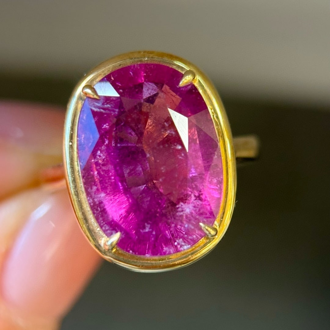 14k Gold 7.50 Ct Natural Tourmaline Ring: Ref:231111225 // gold content:14k gold // ring size:7. 25us // // main gemstone:tourmaline // shape:oval // carat weight:7. 50ct // color:red // treatment:natural // High Estimate: 7900Condition: