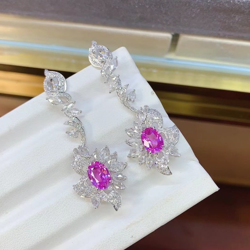 14k Gold 5.02 Ctw Natural Sapphire & Diamond Earrings: Ref:231112074 // gold content:14k gold // main gemstone:sapphire // shape:oval // carat weight:2. 66ct // color:pink // treatment:natural // // adjacent gemstone 2 : diamond // shape:multiple //
