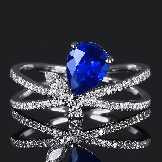 14k Gold 1.59 Ctw Natural Sapphire & Diamond Ring: Ref:231112084 // gold content:14k gold // ring size:7. 25us // // main gemstone:sapphire // shape:pear // carat weight:1. 32ct // color:blue // treatment:natural // // adjacent gemstone 2 :