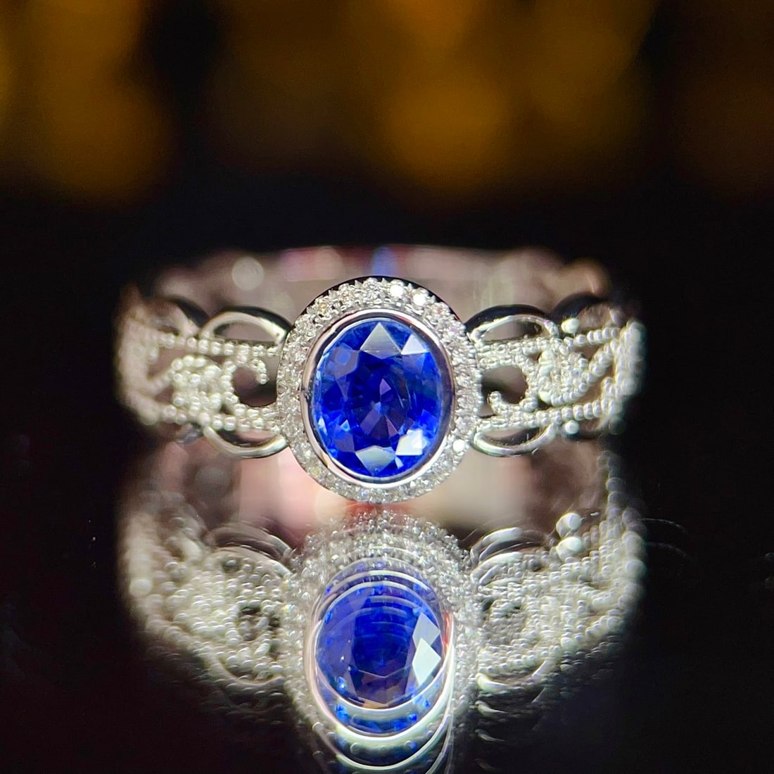 14k Gold 0.82 Ctw Vivid Blue Natural Sapphire & Diamond Ring: Ref:231112127 // gold content:14k gold // ring size:7. 25us // // main gemstone:sapphire // shape:oval // carat weight:0. 74ct // color:vivid blue // treatment:natural // // adjacent gemstone 2 :