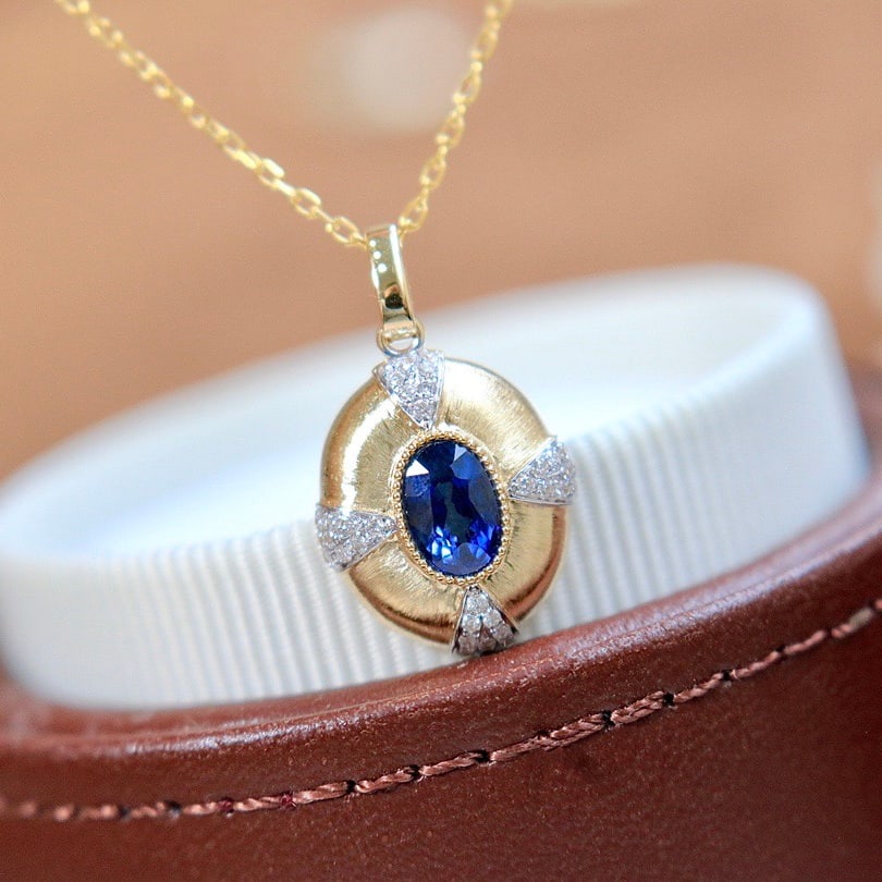 14k Gold 0.6 Ct Natural Sapphire & Diamond Pendant( Without Chain ): Ref:231112154 // gold content:14k gold // main gemstone:sapphire // shape:oval // carat weight:0. 6ct // color:blue // treatment:natural // // adjacent gemstone 2 : diamond // shape:round //