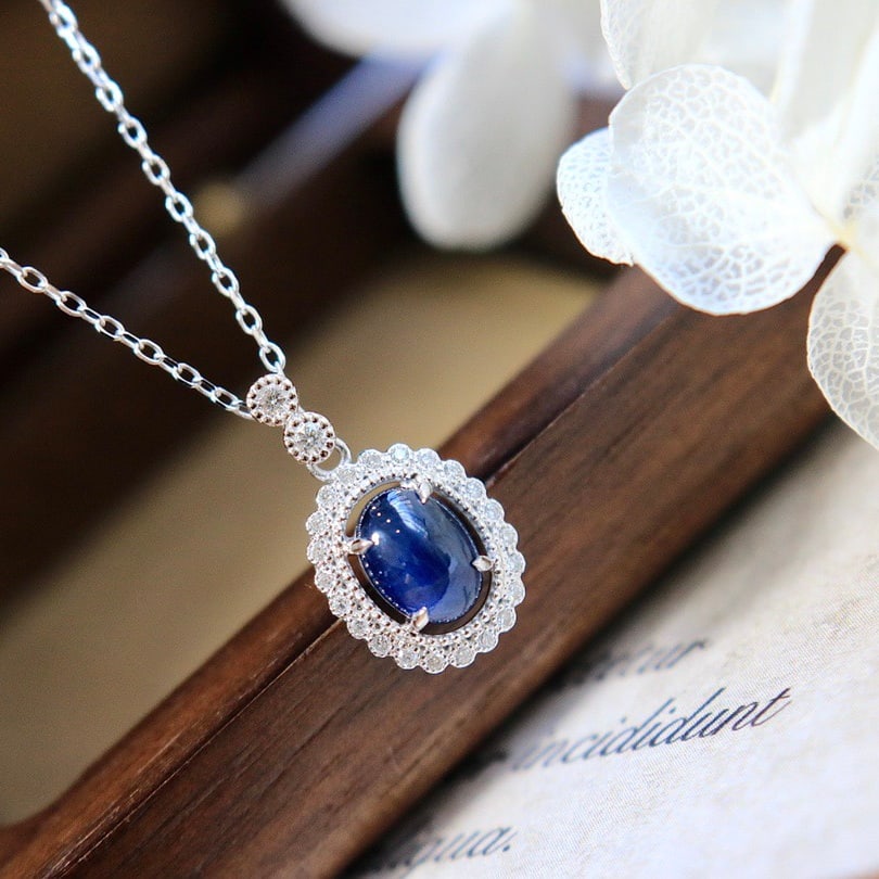 14k Gold 1.22 Ctw Natural Sapphire & Diamond Pendant( Without Chain ): Ref:231112168 // gold content:14k gold // main gemstone:sapphire // shape:oval // carat weight:1. 1ct // color:blue // treatment:natural // // adjacent gemstone 2 : diamond // shape:round // carat