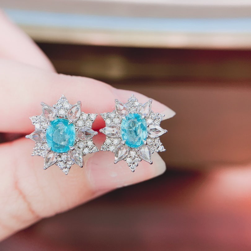 14k Gold 2.0 Ctw Natural Paraiba Tourmaline & Diamond Earrings: Ref:231112206 // gold content:14k gold // main gemstone:paraiba tourmaline // shape:oval // carat weight:1. 2ct // color:blue // treatment:natural // // adjacent gemstone 2 : diamond // shape:multiple