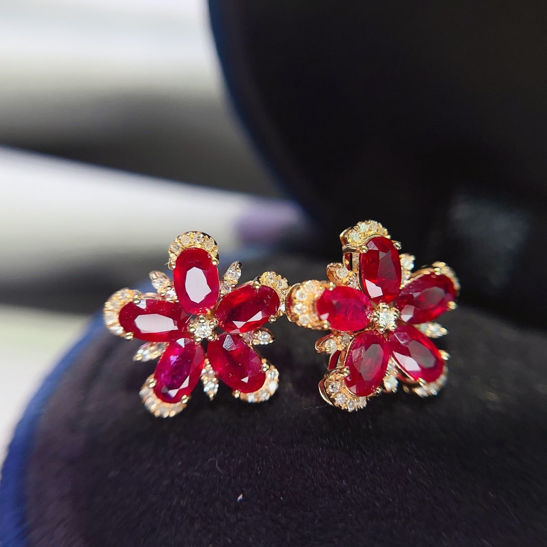14k Gold 3.45 Ct Natural Ruby & Diamond Earrings: Ref:231112344 // gold content:14k gold // main gemstone:ruby // shape:oval // carat weight:3. 45ct // color:red // treatment:natural // // adjacent gemstone 2 : diamond // number of stones:32 //