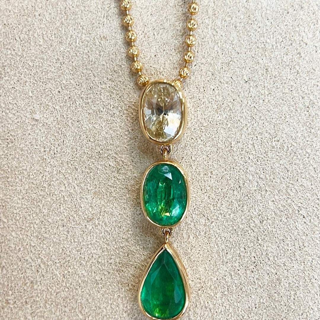 14k Gold 3.17 Ctw Natural Emerald & Sapphire Pendant( Without Chain ): Ref:231112362 // gold content:14k gold // main gemstone:emerald // shape:multiple // carat weight:1. 98ct // color:green // treatment:natural // // adjacent gemstone 2 : sapphire // shape:oval //