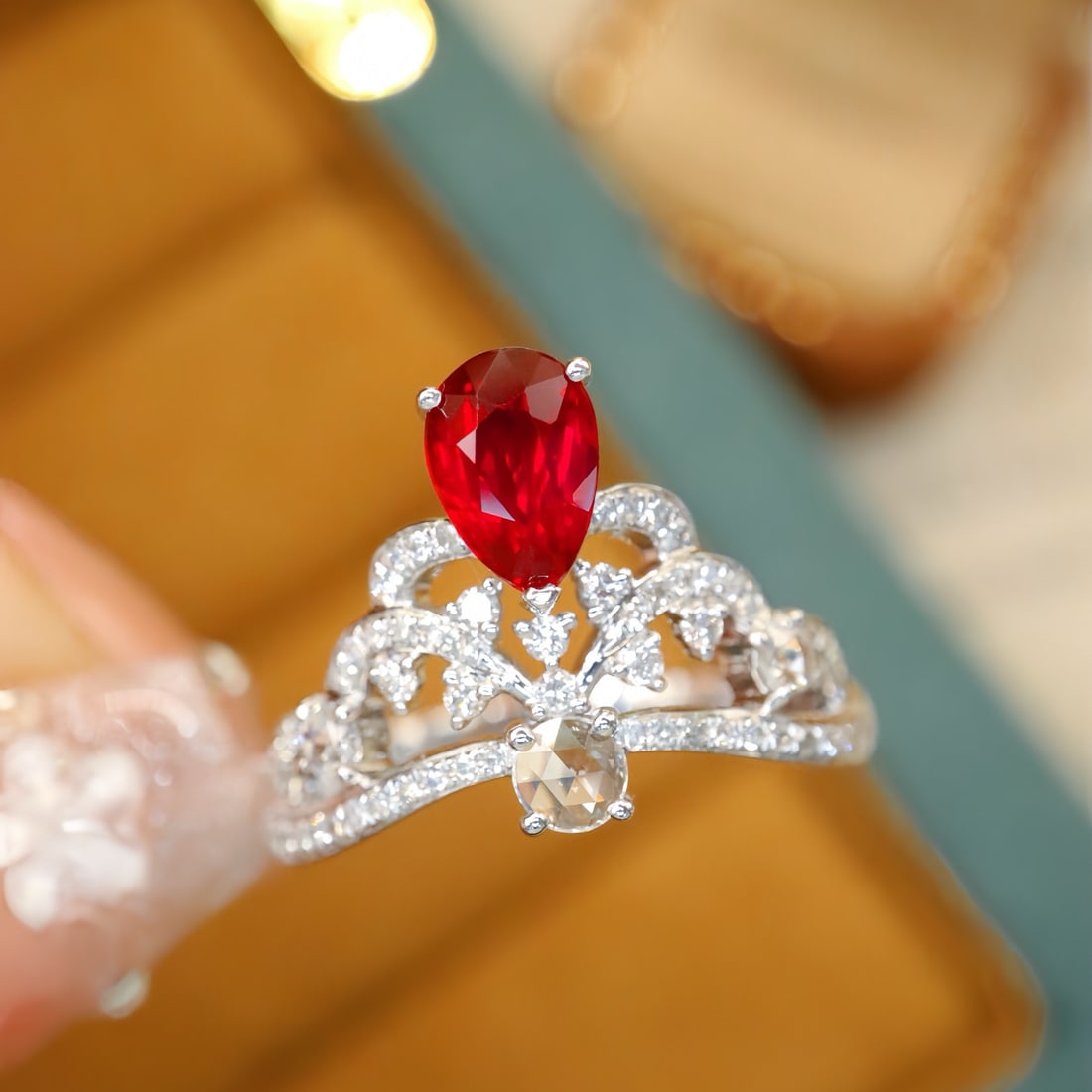 14k Gold 1.40 Ctw Natural Ruby & Diamond Ring: Ref:231112377 // gold content:14k gold // ring size:7. 25us // // main gemstone:ruby // shape:pear // carat weight:1. 02ct // color:pigeonblood red // treatment:natural // // adjacent gemstone 2 : dia