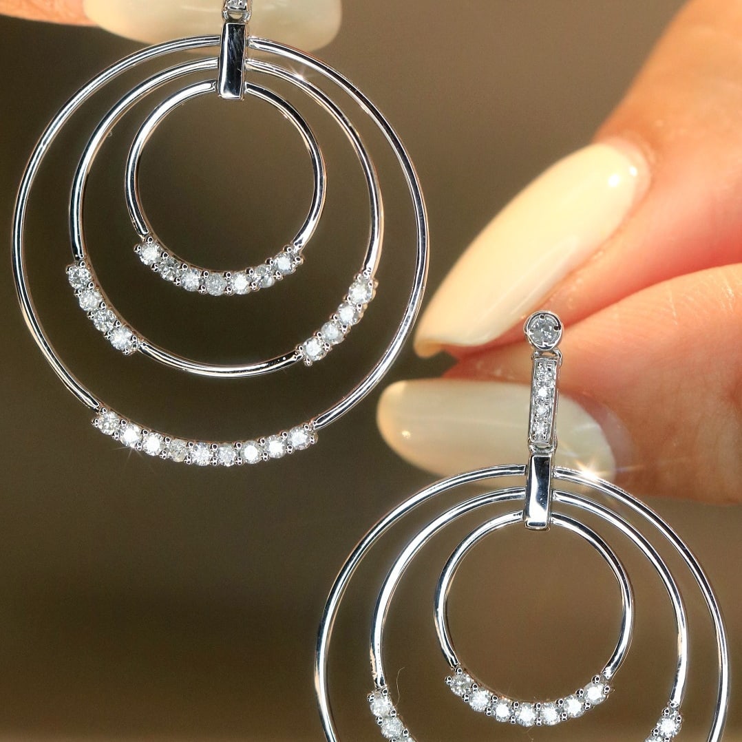 14k Gold 0.62 Ct Natural H Diamond Earrings: Ref:231112433 // gold content:14k gold // main gemstone:diamond // shape:round // carat weight:0. 62ct // clarity grade:vs-si // color:h // treatment:natural // cut grade:g // Condition: NewLow