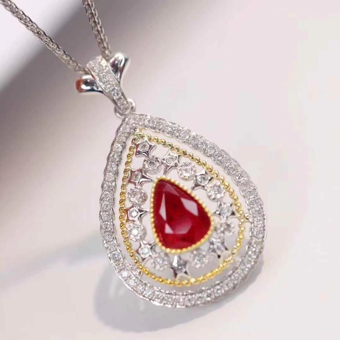 14k Gold 1.30 Ctw Natural Ruby & Diamond Pendant( Without Chain ): Ref:230935010 // gold content:14k gold // main gemstone:ruby // shape:pear // carat weight:1ct // color:pigeonblood red // treatment:natural // // adjacent gemstone 2 : diamond // shape:round //