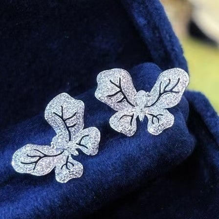 14k Gold 0.7 Ct Natural H Diamond & Butterfly Earrings: Ref:230935025 // gold content:14k gold // main gemstone:diamond // shape:multiply // carat weight:0. 7ct // clarity grade:vs-si // color:h // treatment:natural // Condition: NewLow Estimate: