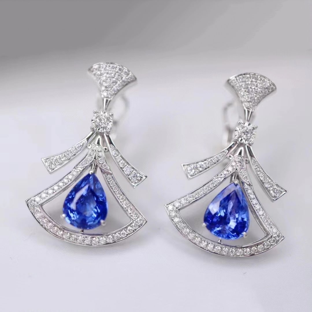 14k Gold 5.49 Ctw Natural Sapphire & Diamond Earrings: Ref:230935055 // gold content:14k gold // main gemstone:sapphire // shape:pear // carat weight:4. 7ct // color:cornflower blue // treatment:natural // // adjacent gemstone 2 : diamond // shape:round /