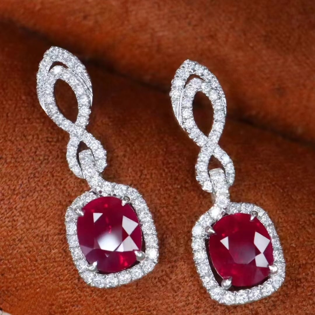 14k Gold 2.54 Ctw Natural Ruby & Diamond Earrings: Ref:230935067 // gold content:14k gold // main gemstone:ruby // shape:oval // carat weight:2. 12ct // color:pigeonblood red // treatment:natural // // adjacent gemstone 2 : diamond // shape:round